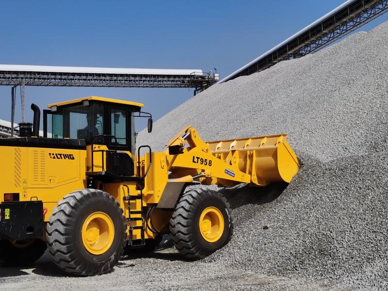 What is the difference between a skid steer and a wheel loader?